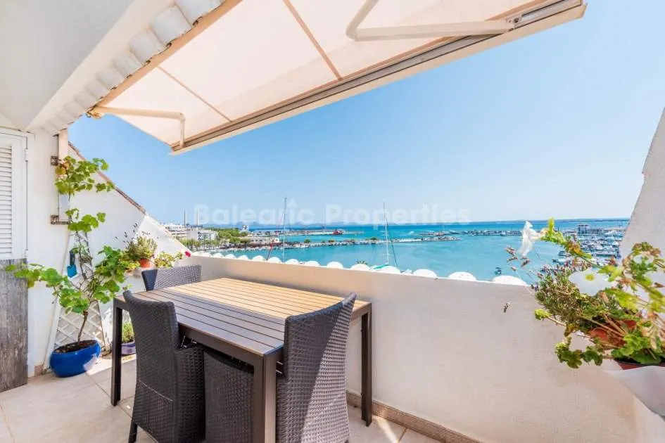 Front line penthouse for sale on the promenade of Puerto Alcudia, Mallorca