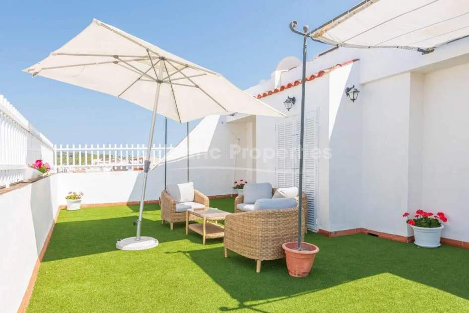 Front line penthouse for sale on the promenade of Puerto Alcudia, Mallorca