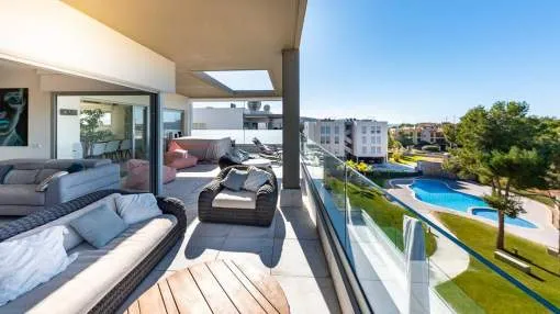 Exclusive penthouse with partial sea views within walking distance of the Port Adriano marina and golf courses